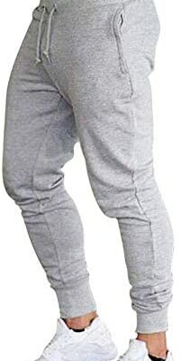 Ni_ka Pantalon de jogging pour homme Taille élastique Sarouel Pantalon de sport décontracté extensible pour homme avec poches Noir Gris Tailles S à 3XL